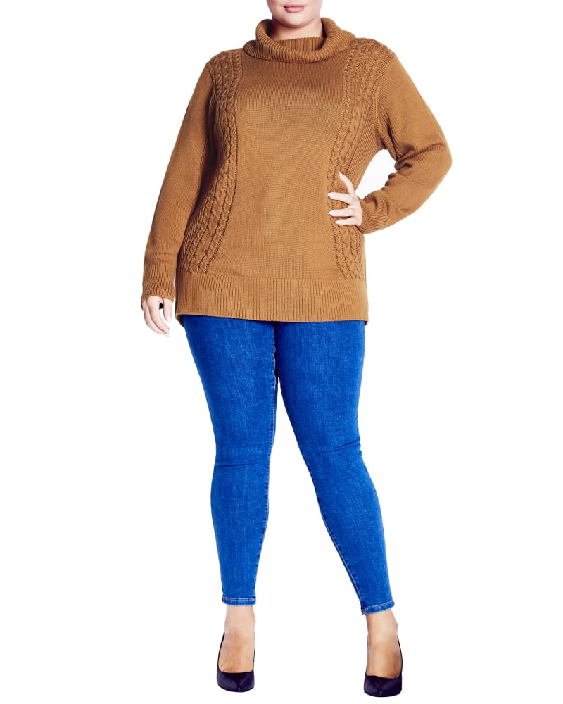 Front of a model wearing a size 16 SWEATER ROSIE CABLE in Almond by avenue. | dia_product_style_image_id:310300